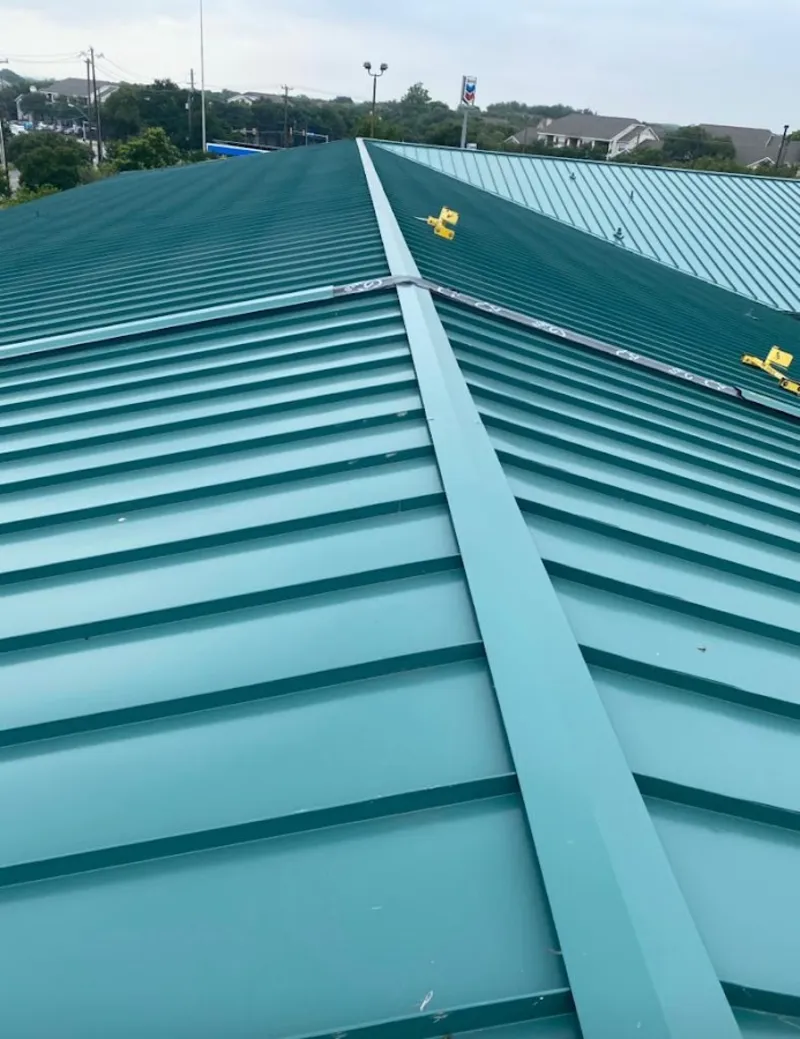 Green commercial metal roof ridge and valley for Metal Roof Repair in Easton